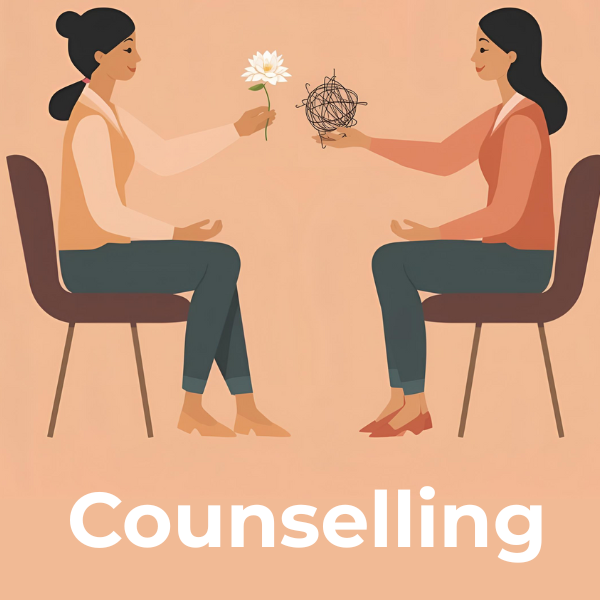 Two women in counseling session, exchanging a flower and tangled wire in a supportive setting.